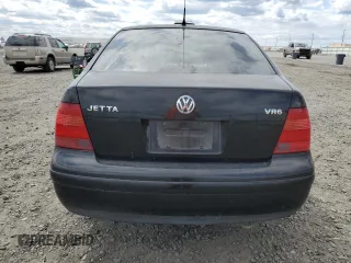 2001 Volkswagen Jetta z VIN 3VWTG69MX1M180164, wystawiony jako Copart lot #59061905 z przebiegiem Nie podano mil oraz Czysty tytuł • Clean title. Historia ofert i sprzedaży dostępna na DreamBid. Obrazek 6.