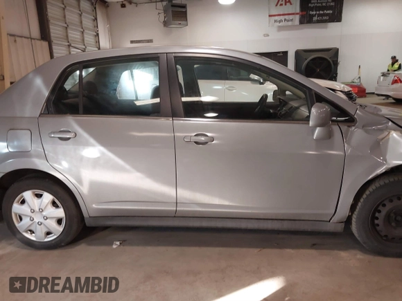 2008 Nissan Versa 1.8 S with VIN 3N1BC11E78L440086, listed as a IAAI auction lot 41362588 with 123,227 mi miles. Bid and sale history available at carsss.com. Image 13.