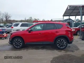 2016 Mazda CX-5 Grand Touring with VIN JM3KE4DY9G0865780, listed as a IAAI auction lot 41913914 with 76,579 mi miles. Bid and sale history available at carsss.com. Image 15.