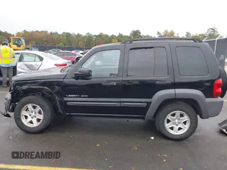2003 Jeep Liberty Sport with VIN 1J4GK48KX3W656837, listed as a IAAI auction lot 40785615 with 164,450 mi miles and . Bid and sale history available at DreamBid. Image 14.