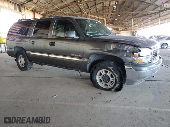 2002 GMC Yukon XL SLT z VIN 3GKFK16Z52G322815, wystawiony jako Copart lot #50641765 z przebiegiem Nie podano mil oraz Szkody całkowita. Historia ofert i sprzedaży dostępna na DreamBid. Obrazek 4.