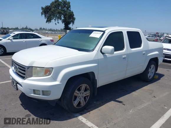2013 Honda Ridgeline RTL with VIN 5FPYK1F50DB013612, listed as a IAAI auction lot 42430119 with 190,913 mi miles and . Bid and sale history available at DreamBid. Image 2.