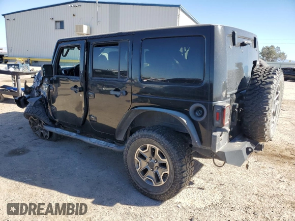 2013 Jeep Wrangler Unlimited Rubicon with VIN 1C4BJWFG2DL533839, listed as a Copart auction lot 88917985 with 112,673 mi miles and Salvage Title. Bid and sale history available at carsss.com. Image 2.