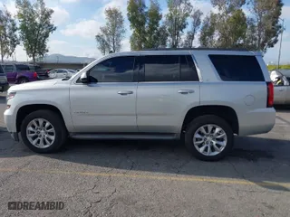 2015 Chevrolet Tahoe LT with VIN 1GNSCBKC8FR114732, listed as a IAAI auction lot 41900157 with 107,298 mi miles. Bid and sale history available at carsss.com. Image 13.