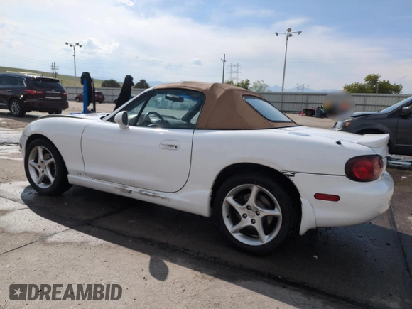 2002 Mazda MX-5 Miata Cloth z VIN JM1NB353X20229549, wystawiony jako Copart lot #54549205 z przebiegiem 79 871 mil mil oraz Szkoda całkowita • Salvage title. Historia ofert i sprzedaży dostępna na DreamBid. Obrazek 2.