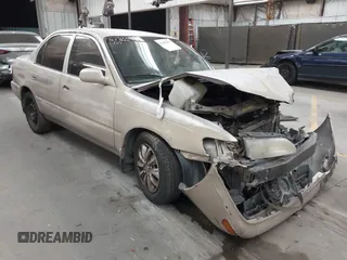 1994 Toyota Corolla z VIN 1NXAE04B0RZ221729, wystawiony jako IAAI lot #42485477 z przebiegiem 258 592 mil mil oraz . Historia ofert i sprzedaży dostępna na DreamBid. Obrazek 1.