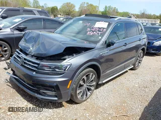 2018 Volkswagen Tiguan SEL Premium with VIN 3VV5B7AX4JM201579, listed as a IAAI auction lot 41932201 with 118,728 mi miles and . Bid and sale history available at DreamBid. Image 2.