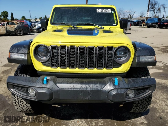 2024 Jeep Wrangler Rubicon z VIN 1C4RJXR64RW193946, wystawiony jako Copart lot #51693105 z przebiegiem 4 863 mil mil oraz Szkoda całkowita • Salvage title. Historia ofert i sprzedaży dostępna na DreamBid. Obrazek 5.