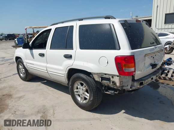 2003 Jeep Grand Cherokee Laredo with VIN 1J4GX48S43C518584, listed as a IAAI auction lot 42213094 with 163,743 mi miles and . Bid and sale history available at DreamBid. Image 3.