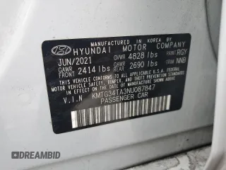 2022 Genesis G70 2.0T with VIN KMTG34TA3NU087847, listed as a Copart auction lot 83541034 with 65,891 mi miles and Salvage Title. Bid and sale history available at DreamBid. Image 12.