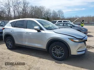 2020 Mazda CX-5 Touring with VIN JM3KFBCM3L0791816, listed as a IAAI auction lot 41761623 with 87,742 mi miles and . Bid and sale history available at carsss.com. Image 13.