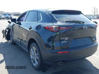 2021 Mazda CX-30 Select with VIN 3MVDMBBL5MM312972, listed as a IAAI auction lot 41792275 with 11,683 mi miles and . Bid and sale history available at carsss.com. Image 3.