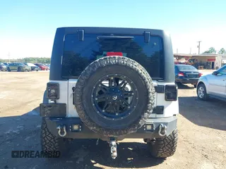 2017 Jeep Wrangler Unlimited Sport with VIN 1C4BJWDG4HL502861, listed as a IAAI auction lot 40895010 with 62,970 mi miles. Bid and sale history available at carsss.com. Image 16.