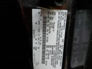 2016 Ford Focus SE z VIN 1FADP3F20GL305441, wystawiony jako Copart lot #55445105 z przebiegiem 117 033 mil mil oraz Szkoda całkowita • Salvage title. Historia ofert i sprzedaży dostępna na DreamBid. Obrazek 13.