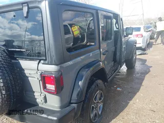 2020 Jeep Wrangler Unlimited Sport Altitude with VIN 1C4HJXDG2LW335228, listed as a IAAI auction lot 41711295 with 43,451 mi miles and . Bid and sale history available at DreamBid. Image 4.
