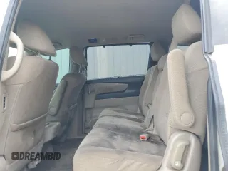 2013 Honda Odyssey EX z VIN 5FNRL5H43DB055987, wystawiony jako Copart lot #54001985 z przebiegiem 162 448 mil mil oraz Szkody całkowita. Historia ofert i sprzedaży dostępna na DreamBid. Obrazek 11.