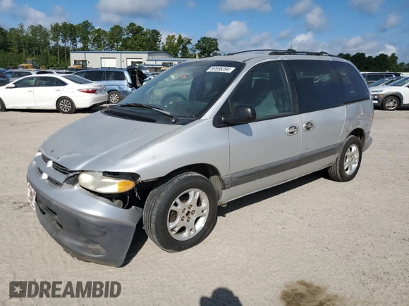 2000 Dodge Caravan SE with VIN 2B4GP45G0YR525310, listed as a Copart auction lot 69596394 with 299,957 mi miles and Salvage Title. Bid and sale history available at carsss.com. Image 1.