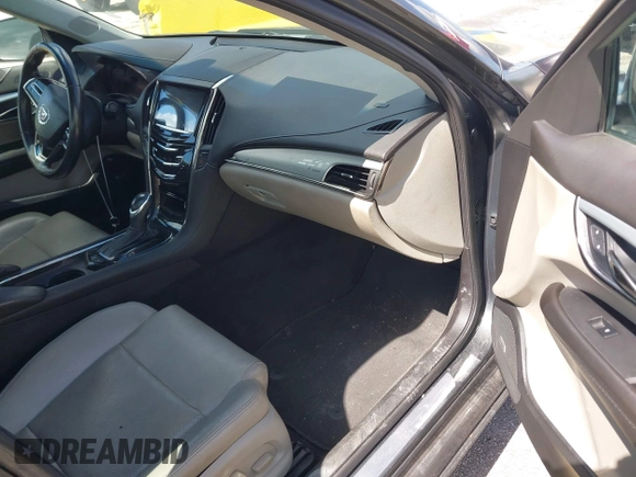 2014 Cadillac ATS Luxury RWD z VIN 1G6AB5RAXE0142079, wystawiony jako IAAI lot #42517963 z przebiegiem 140 118 mil mil oraz . Historia ofert i sprzedaży dostępna na DreamBid. Obrazek 5.