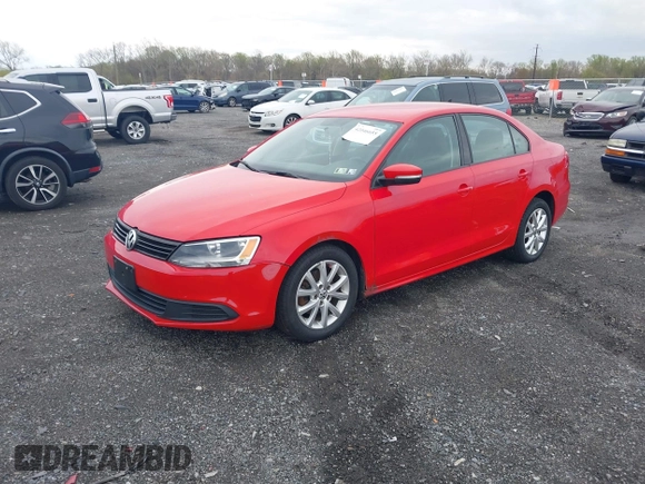 2011 Volkswagen Jetta Sedan SE w/Convenience & Sunroof PZEV with VIN 3VWDZ7AJ0BM061238, listed as a IAAI auction lot 42046655 with 174,131 mi miles. Bid and sale history available at carsss.com. Image 2.