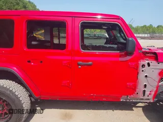 2022 Jeep Wrangler Unlimited Rubicon with VIN 1C4HJXFG0NW100620, listed as a IAAI auction lot 42534993 with 21,614 mi miles and . Bid and sale history available at DreamBid. Image 13.