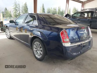 2013 Chrysler 300 with VIN 2C3CCAET7DH673242, listed as a IAAI auction lot 41785948 with 135,968 mi miles. Bid and sale history available at carsss.com. Image 3.