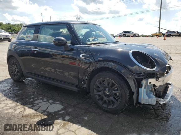 2015 MINI Hardtop with VIN WMWXM5C55F3A04740, listed as a Copart auction lot 61616655 with 95,108 mi miles and Salvage title. Bid and sale history available at DreamBid. Image 4.