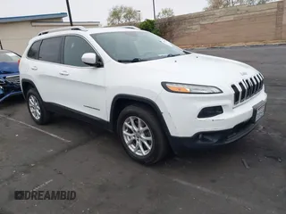 2015 Jeep Cherokee Latitude with VIN 1C4PJLCB0FW761871, listed as a IAAI auction lot 42099336 with 213,049 mi miles. Bid and sale history available at carsss.com. Image 1.