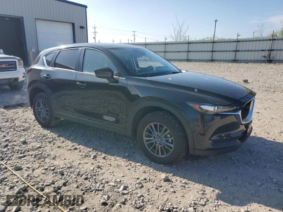 2021 Mazda CX-5 Touring z VIN JM3KFBCM5M0471172, wystawiony jako Copart lot #56646065 z przebiegiem 42 843 mil mil oraz Szkody całkowita. Historia ofert i sprzedaży dostępna na DreamBid. Obrazek 4.