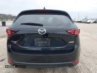 2018 Mazda CX-5 Grand Touring with VIN JM3KFBDM3J0384431, listed as a IAAI auction lot 42013474 with 65,018 mi miles. Bid and sale history available at carsss.com. Image 16.