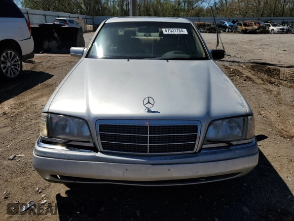 1995 Mercedes-Benz C with VIN WDBHA28E7SF255142, listed as a Copart auction lot 68411704 with 334,000 mi miles and Salvage Title. Bid and sale history available at carsss.com. Image 5.