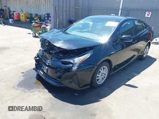 2016 Toyota Prius Four z VIN JTDKARFU7G3017018, wystawiony jako IAAI lot #42224376 z przebiegiem 74 136 mil mil oraz . Historia ofert i sprzedaży dostępna na DreamBid. Obrazek 2.