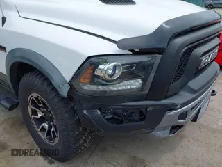 2016 Ram 1500 Rebel with VIN 1C6RR7YTXGS417801, listed as a IAAI auction lot 42382016 with 142,636 mi miles and . Bid and sale history available at DreamBid. Image 6.