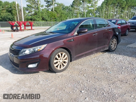2015 Kia Optima EX with VIN 5XXGN4A75FG351223, listed as a IAAI auction lot 42732567 with 124,400 mi miles and . Bid and sale history available at DreamBid. Image 2.