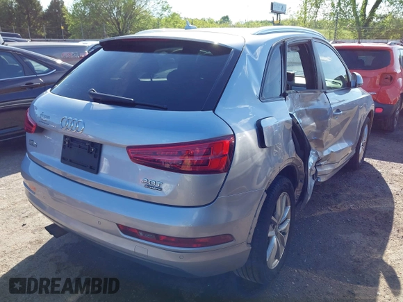 2017 Audi Q3 Premium with VIN WA1ECCFSXHR002623, listed as a IAAI auction lot 42077132 with 118,511 mi miles and . Bid and sale history available at DreamBid. Image 4.