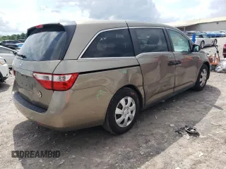 2012 Honda Odyssey LX с VIN 5FNRL5H29CB081071, выставлен на аукционе Copart как лот 56751545 с пробегом 233 240 миль миль и Списание • Salvage title. История ставок и продаж доступна на DreamBid. Изображение 3.