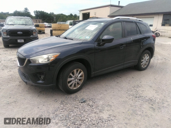 2014 Mazda CX-5 Touring z VIN JM3KE2CYXE0429149, wystawiony jako IAAI lot #42471772 z przebiegiem 222 440 mil mil oraz . Historia ofert i sprzedaży dostępna na DreamBid. Obrazek 2.