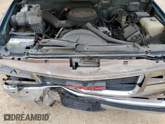 1995 GMC Suburban z VIN 1GKEC16K9SJ708907, wystawiony jako Copart lot #56415125 z przebiegiem 251 343 mil mil oraz Szkoda całkowita • Salvage title. Historia ofert i sprzedaży dostępna na DreamBid. Obrazek 12.