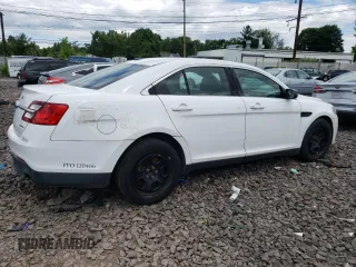 2015 Ford Police Interceptor with VIN 1FAHP2L88FG149368, listed as a Copart auction lot 58314574 with 155,383 mi miles and Salvage title. Bid and sale history available at DreamBid. Image 3.