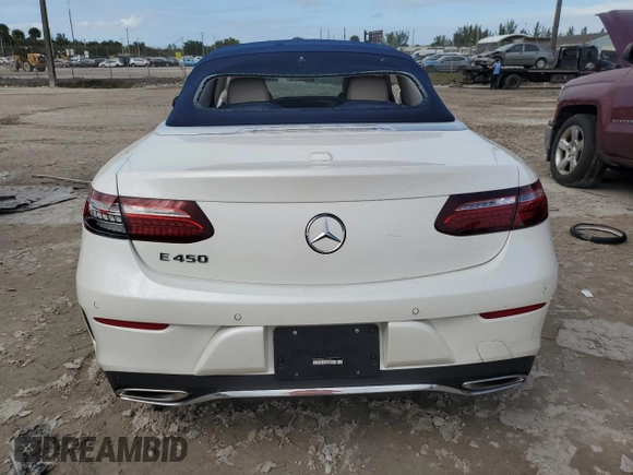 2021 Mercedes-Benz E 450 with VIN W1K1K5JB8MF157053, listed as a Copart auction lot 77119904 with 14,081 mi miles and Salvage title. Bid and sale history available at DreamBid. Image 6.