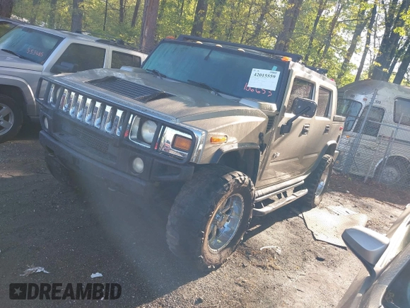 2005 Hummer H2 SUT with VIN 5GRGN22UX5H106653, listed as a IAAI auction lot 42015559 with 180,519 mi miles. Bid and sale history available at carsss.com. Image 2.