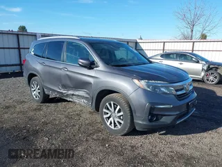 2019 Honda Pilot EX-L with VIN 5FNYF6H5XKB038196, listed as a IAAI auction lot 41852236 with 99,477 mi miles. Bid and sale history available at carsss.com. Image 1.