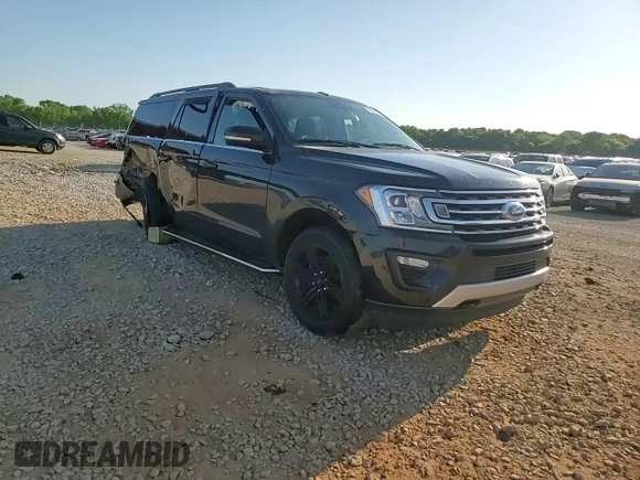2021 Ford Expedition Max XLT with VIN 1FMJK1JT6MEA21825, listed as a Copart auction lot 52828885 with 135,431 mi miles and Salvage Title. Bid and sale history available at DreamBid. Image 14.