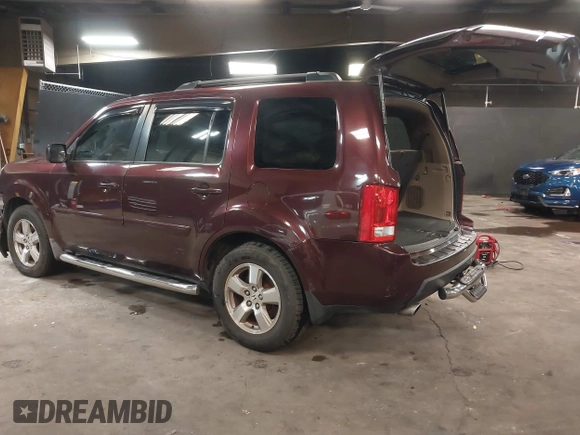 2009 Honda Pilot EX-L with VIN 5FNYF48569B021586, listed as a IAAI auction lot 41609721 with 291,598 mi miles. Bid and sale history available at carsss.com. Image 3.