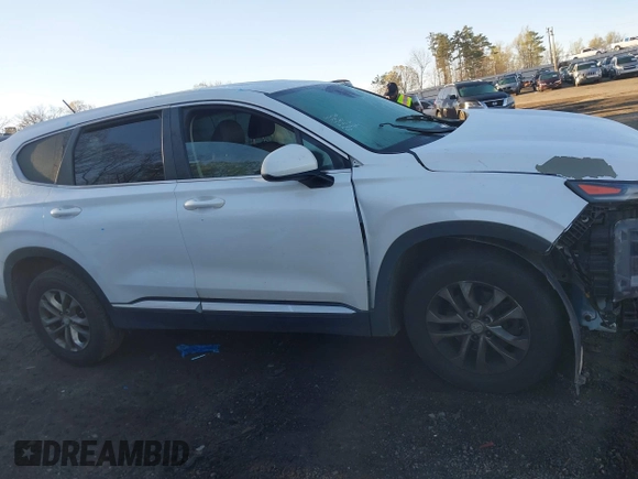 2019 Hyundai Santa Fe SE with VIN 5NMS2CAD6KH114027, listed as a IAAI auction lot 41874556 with 125,729 mi miles. Bid and sale history available at carsss.com. Image 13.