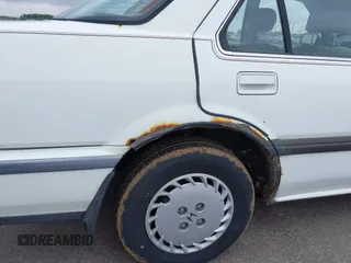 1988 Honda Accord z VIN 1HGCA5636JA003992, wystawiony jako IAAI lot #42474683 z przebiegiem 184 868 mil mil oraz . Historia ofert i sprzedaży dostępna na DreamBid. Obrazek 6.