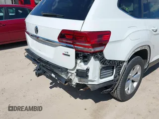 2018 Volkswagen Atlas SE with VIN 1V2KR2CAXJC586848, listed as a IAAI auction lot 42200959 with 96,336 mi miles and . Bid and sale history available at DreamBid. Image 19.