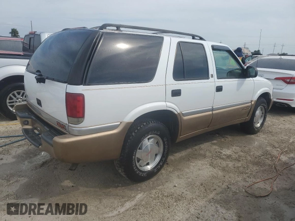 2000 GMC Jimmy SL with VIN 1GKCS13W4Y2106047, listed as a Copart auction lot 75257184 with 73,571 mi miles and Non Repairable. Bid and sale history available at carsss.com. Image 3.