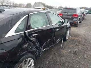 2015 Cadillac XTS Luxury with VIN 2G61M5S38F9138545, listed as a IAAI auction lot 41690696 with 136,460 mi miles and . Bid and sale history available at DreamBid. Image 6.