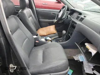 2000 Toyota Camry CE z VIN JT2BG22K7Y0479410, wystawiony jako Copart lot #57871825 z przebiegiem 222 941 mil mil oraz Tytuł czysty. Historia ofert i sprzedaży dostępna na DreamBid. Obrazek 7.