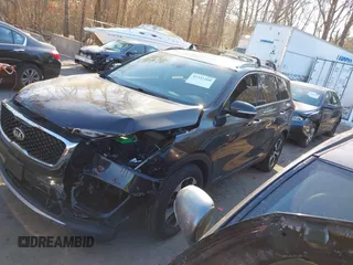 2018 Kia Sorento EX with VIN 5XYPHDA54JG410997, listed as a IAAI auction lot 41332269 with 163,742 mi miles and . Bid and sale history available at carsss.com. Image 2.